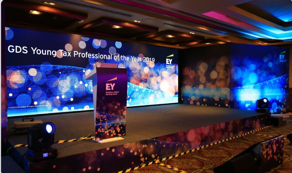 EY corporate conference stage with professional production