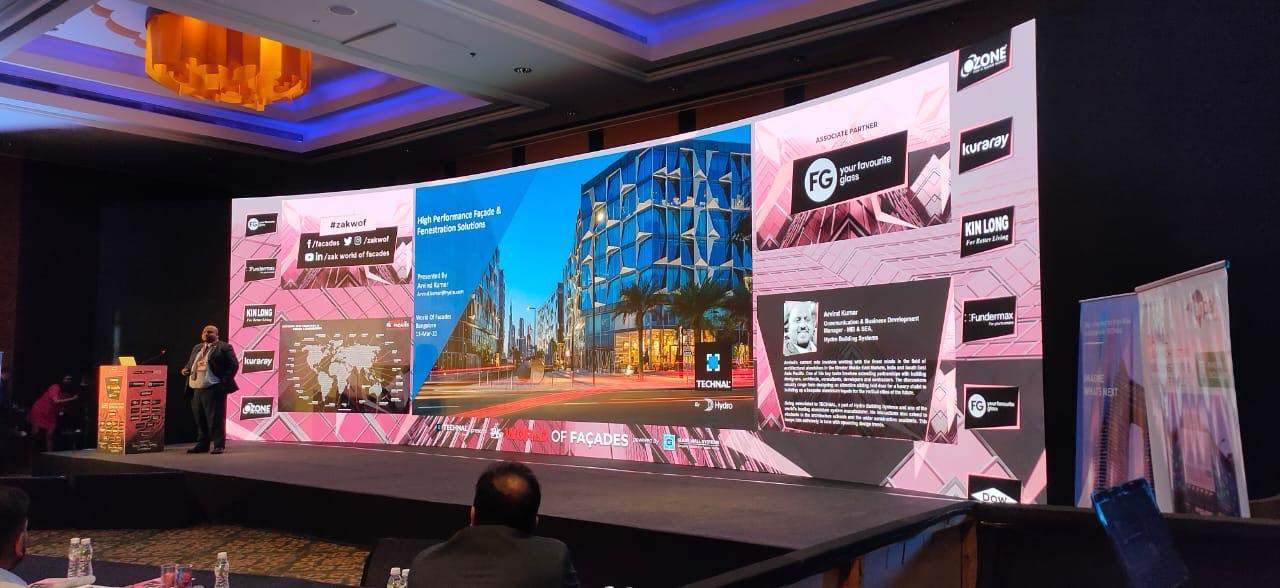 Technal high performance facade corporate presentation stage with large LED screens